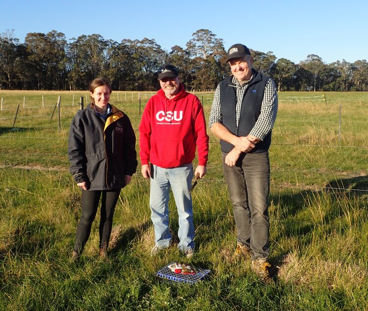 Ashley Amourgis, Graeme Heath and Russ Barrow with a dung beetle pitfall trap.