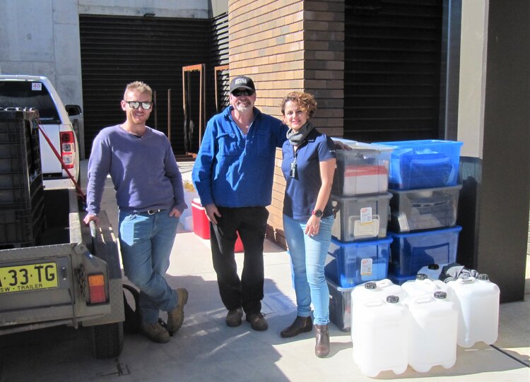 Zac Hemmings, Graeme Heath and Behnaz Ghaedi at UNE taking delivery of the dung beetle field monitoring kits