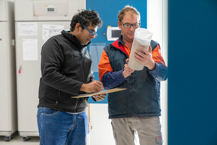 Aga Thotagamuwa and Geoff Burgess at the mass rearing facilities at Charles Sturt University